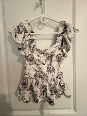 Francesca's Collections White Top with Black Toile Print and Ruffle Peplum